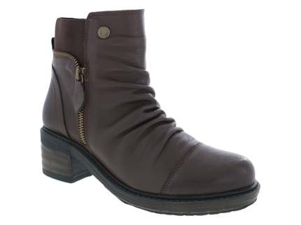 A dark brown leather ankle boot with a side zipper, a small gold-tone snap button, and a chunky dark block heel, shown against a plain white background.