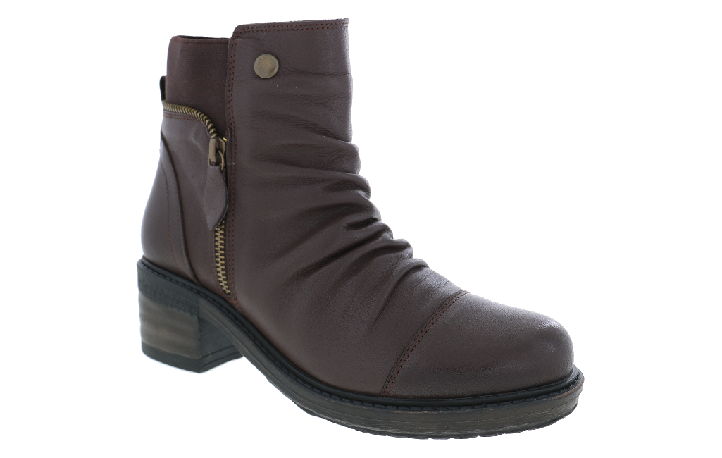 A dark brown leather ankle boot with a side zipper, a small gold-tone snap button, and a chunky dark block heel, shown against a plain white background.