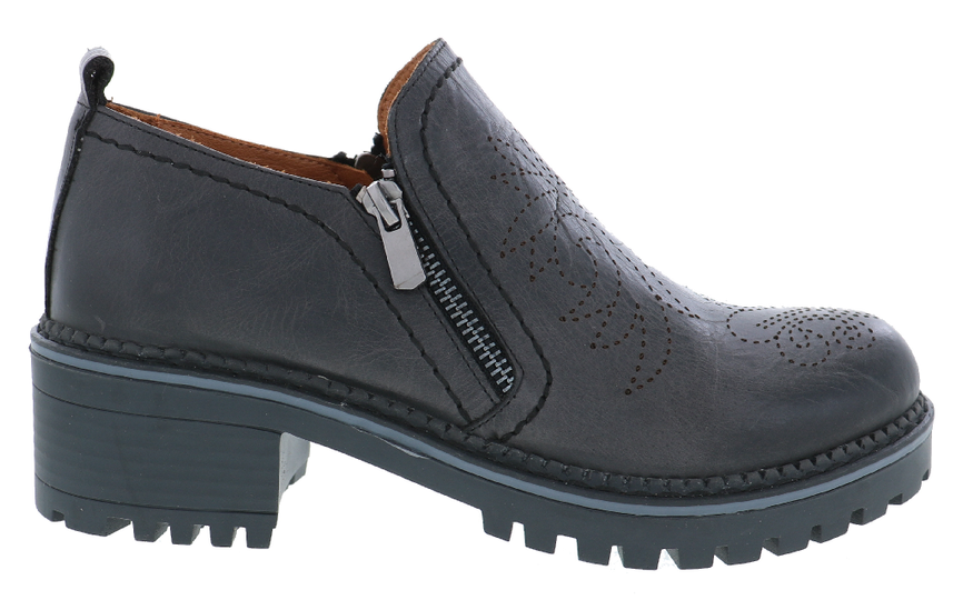 A dark gray leather slip-on shoe with a side zipper, decorative perforations on the toe, and a chunky lug sole, shown against a plain white background.